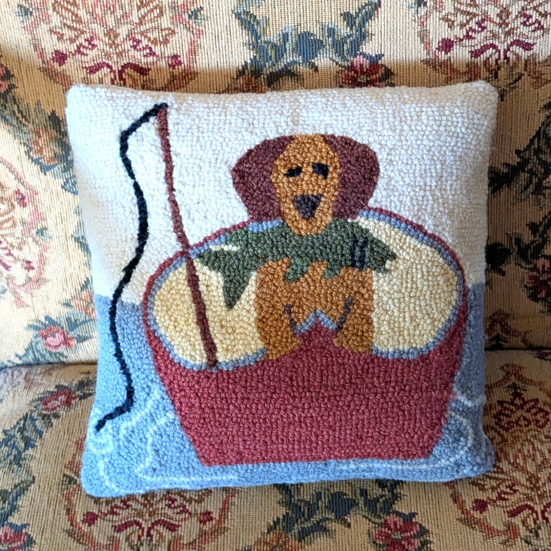Dog Fishing in Canoe with Fish in Mouth Hooked Throw Pillow