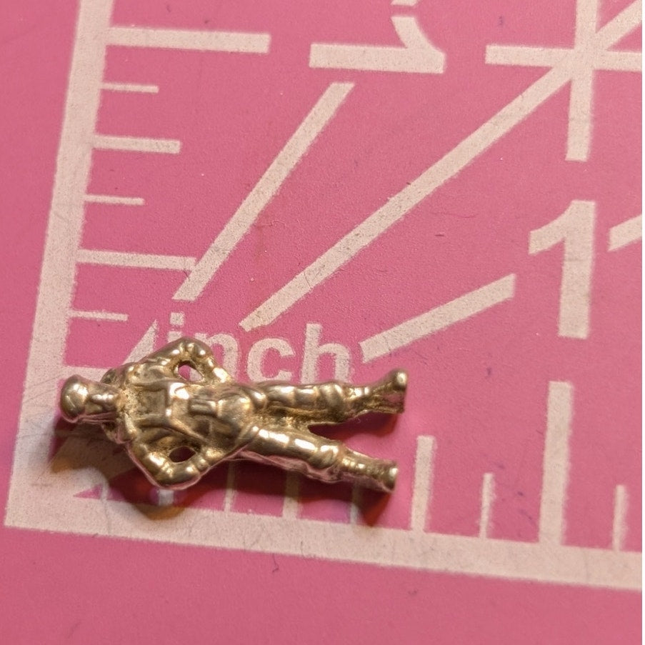 Vintage Tiny Silver Tone Man W/ Hands on Hips Possibly Astronaut Charm