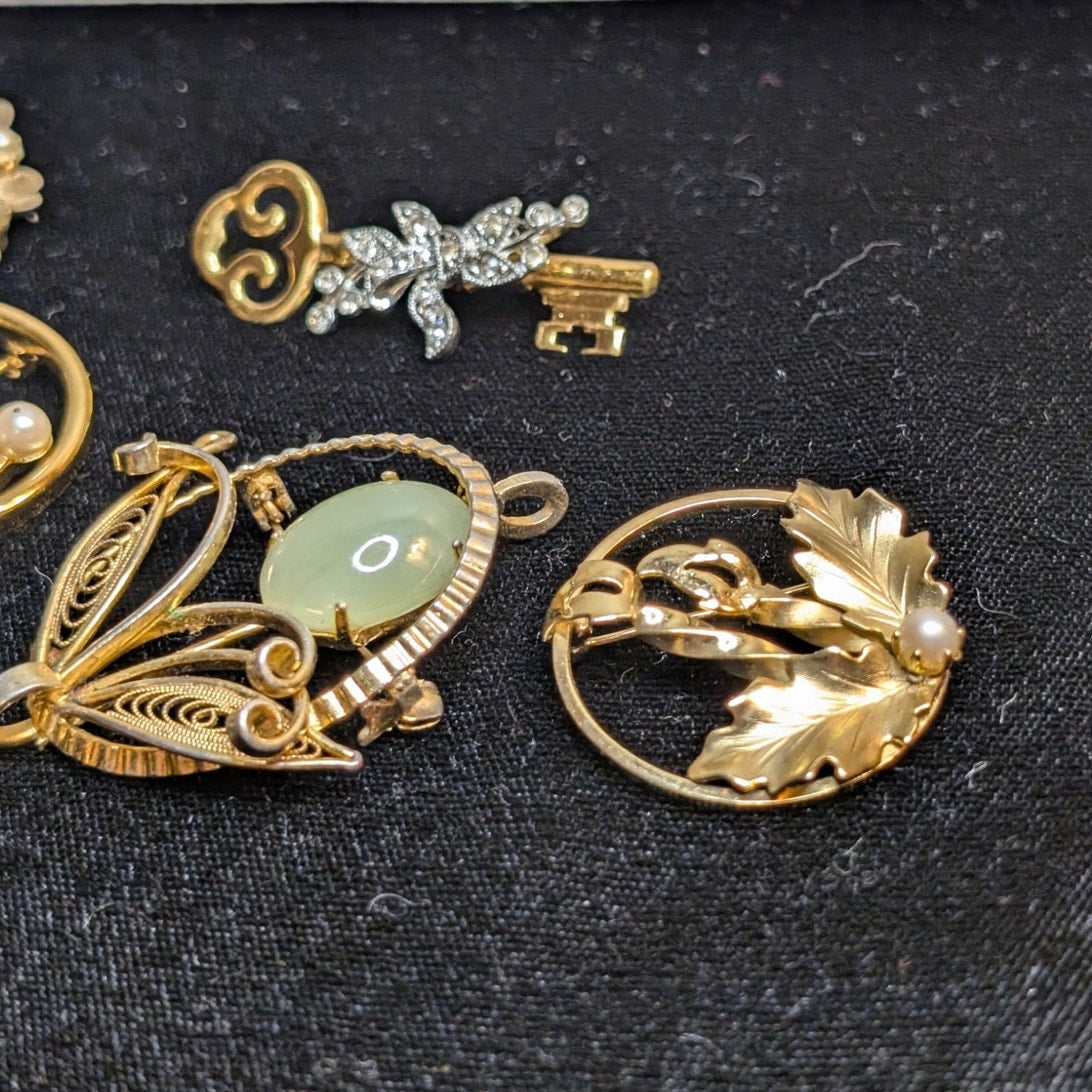 Lot of Eight Vintage Gold Tone Themed Brooches