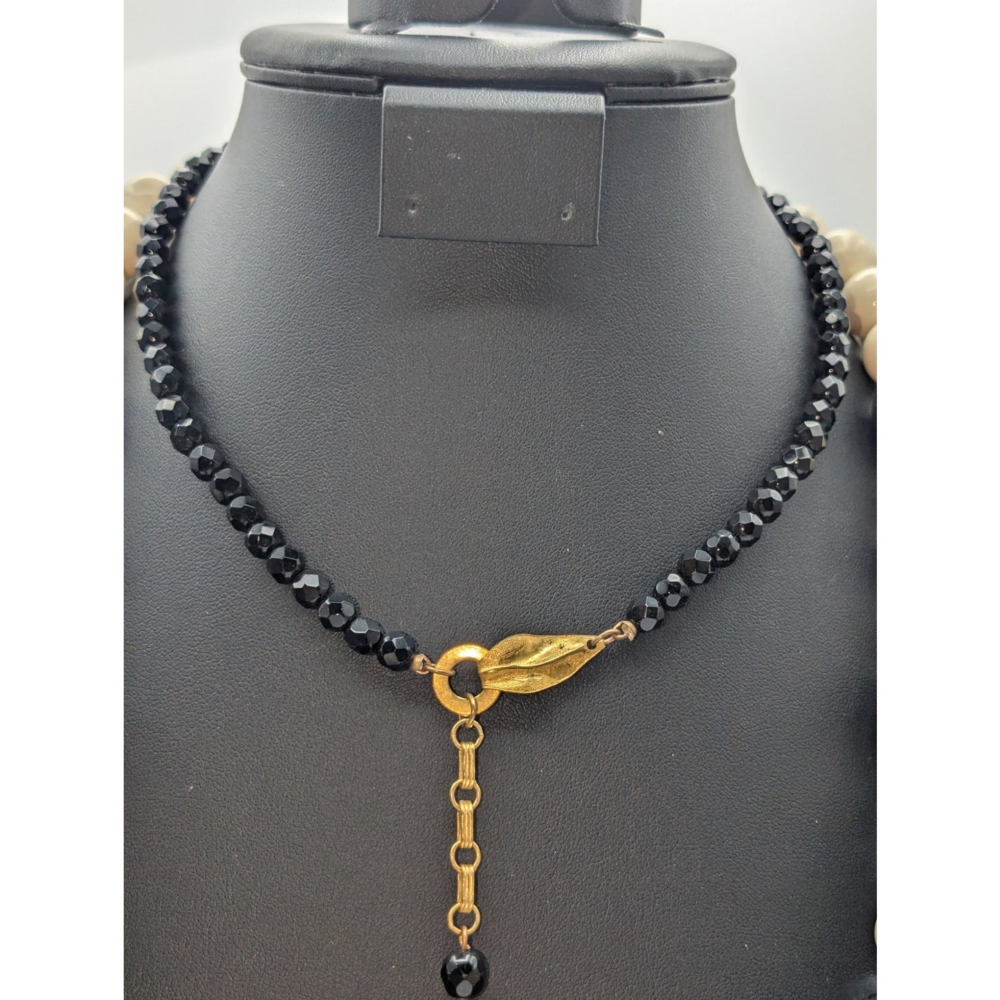 Lot of Ten Cream Black Jewelry Pieces -- Four Necklaces & Six Bracelets