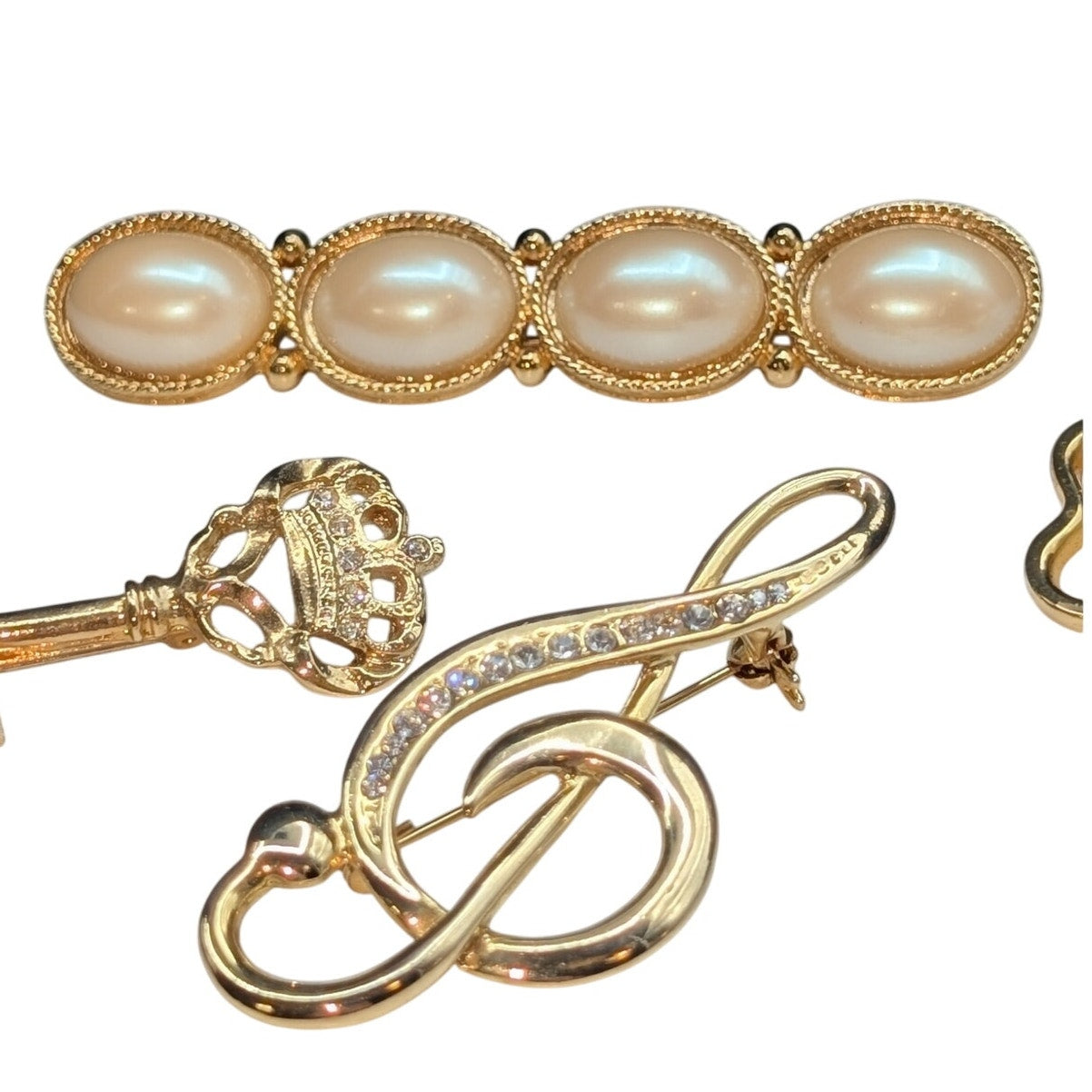 Lot of Four Gold Tone Brooches