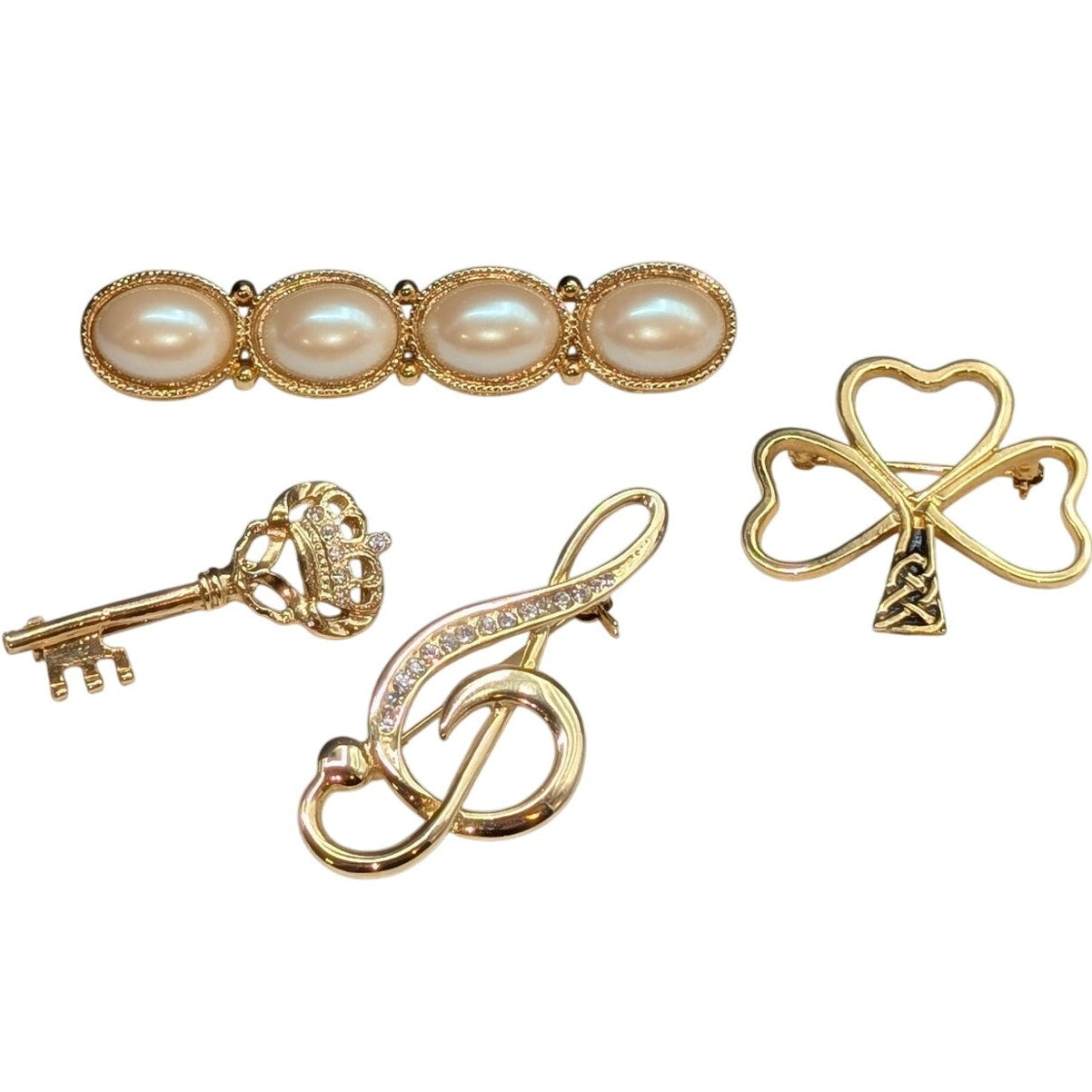 Lot of Four Gold Tone Brooches