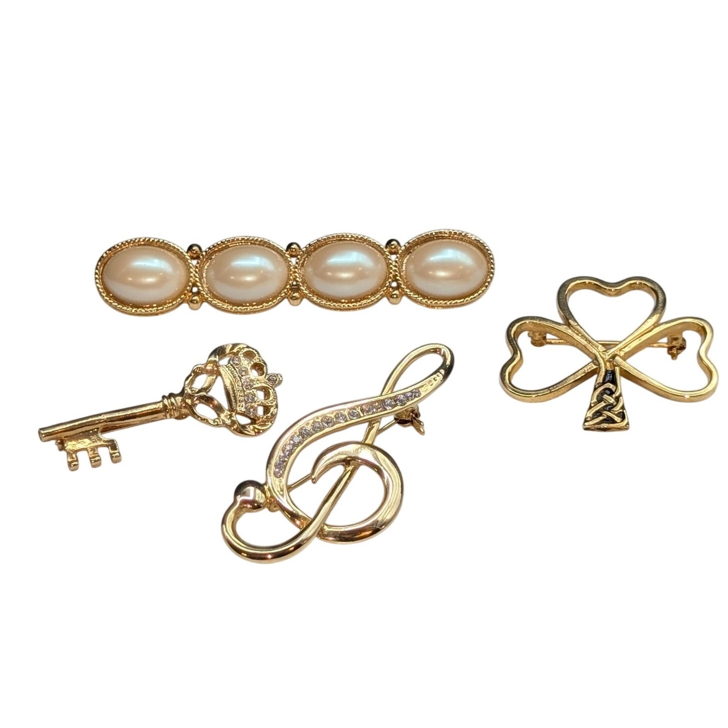 Lot of Four Gold Tone Brooches
