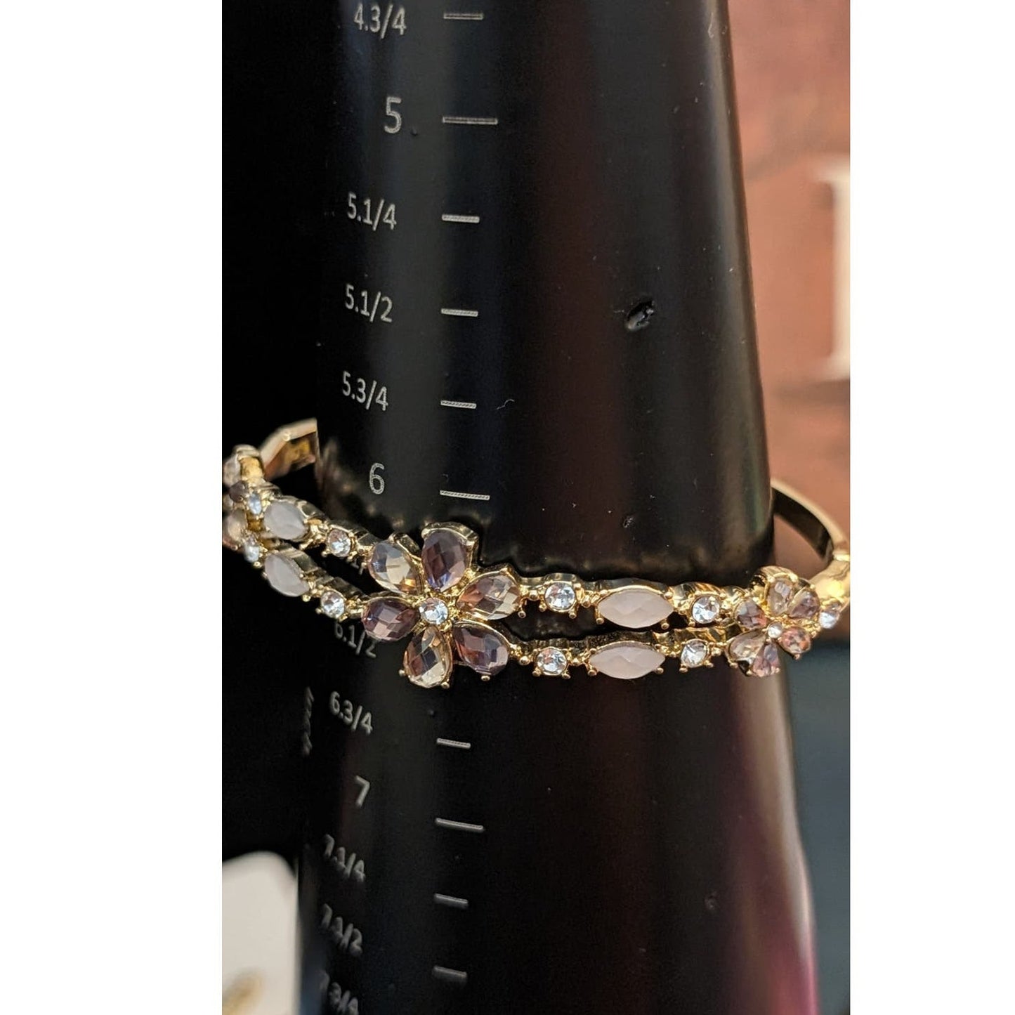 Anne Klein Gold Tone Crystal Floral Oval Bangle Bracelet