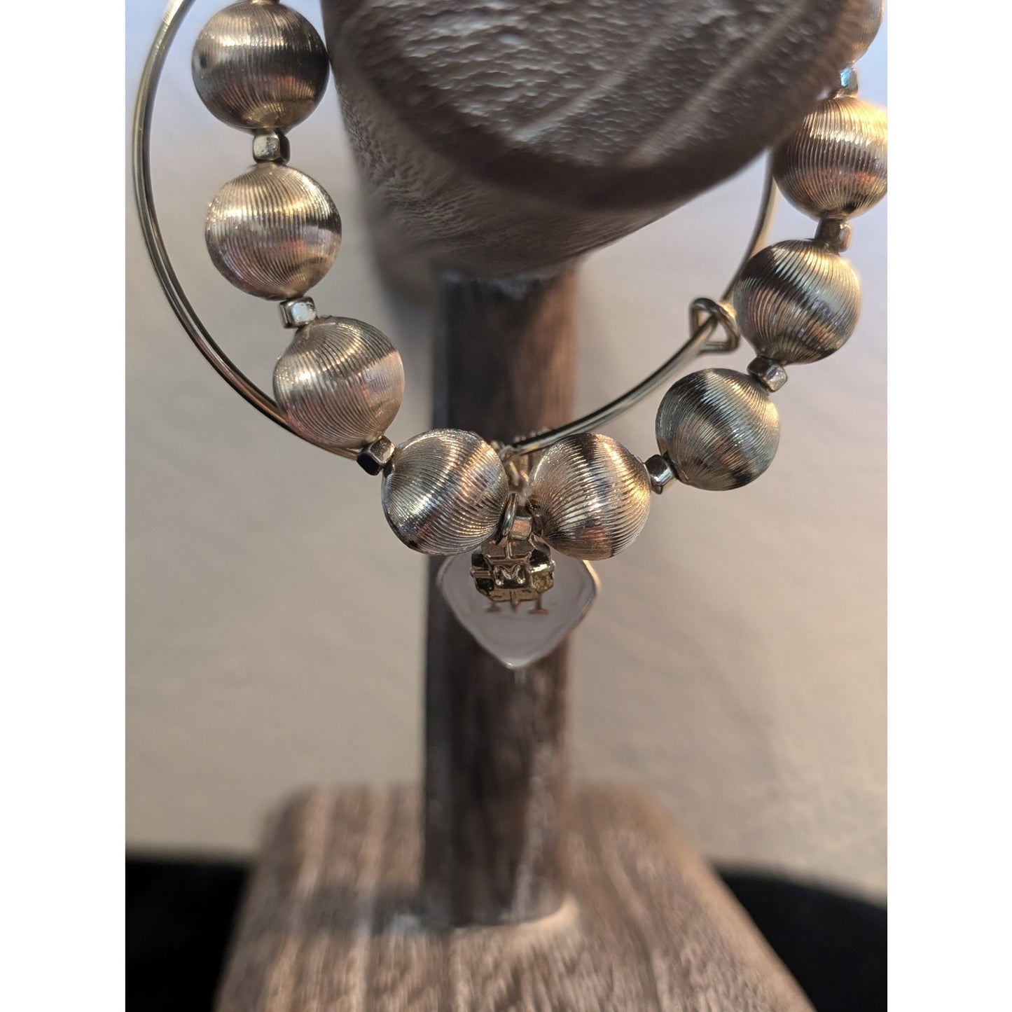 Lot of Two Gold Tone Bracelets Monet Textured Bead Stretch & 'M' Charm Bangle