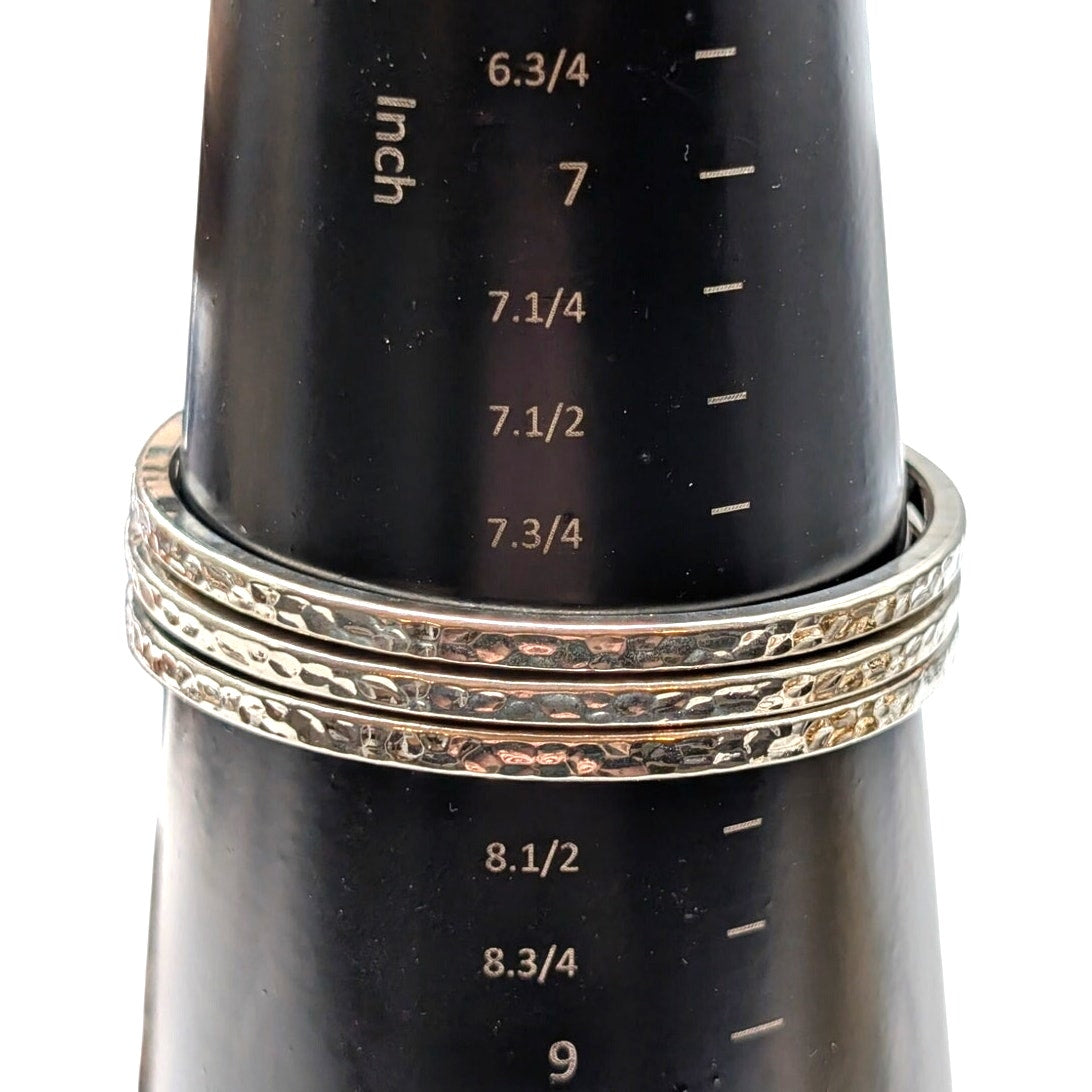 Three Silver Tone Hammered Silver Tone Bangle Bracelets