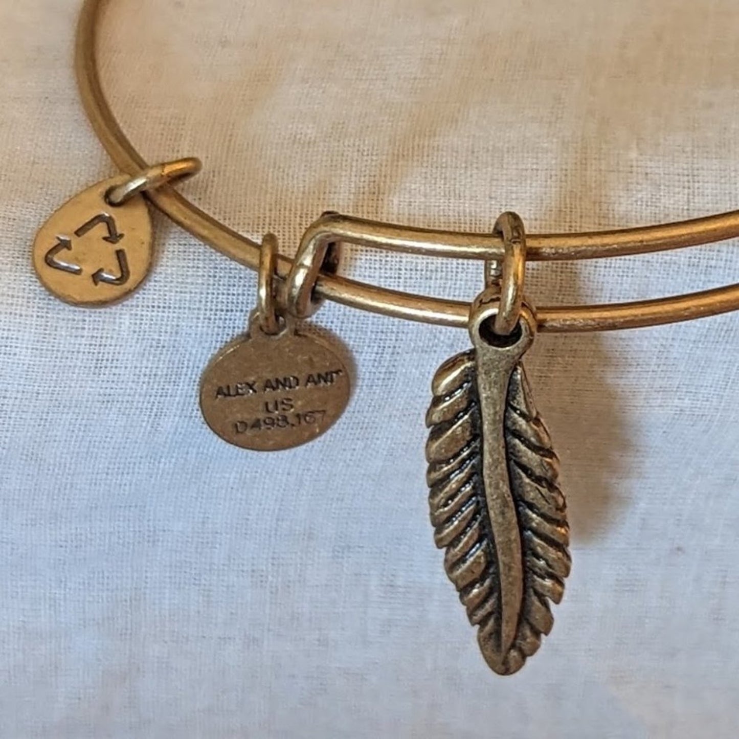 Alex and Ani Feather Charm Gold Tone Adjustable Slide Bangle Bracelet