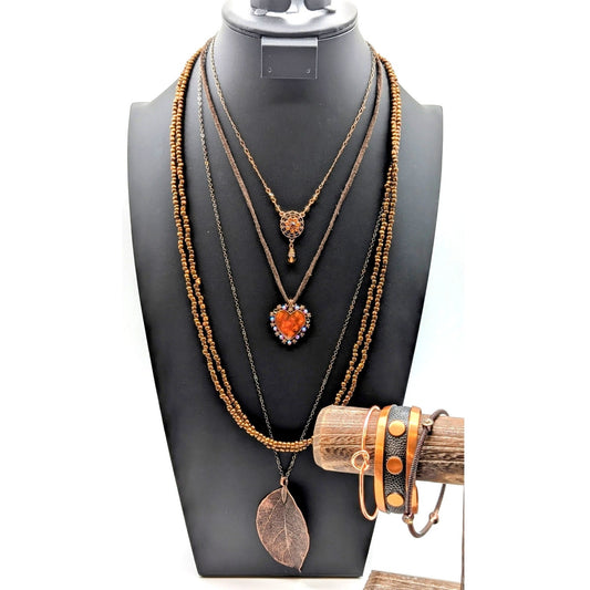 Seven Piece Copper Lot Four Necklaces & Three Bracelets
