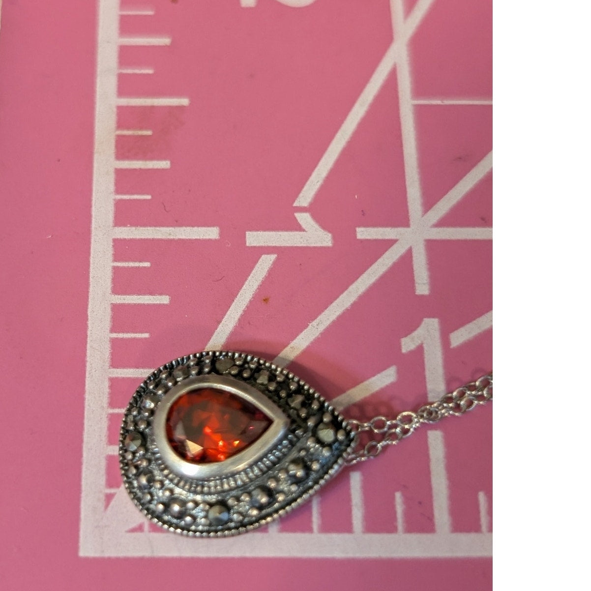 925 Sterling Bezel Set Red Faceted Crystal Teardrop Marcasite Surround Necklace