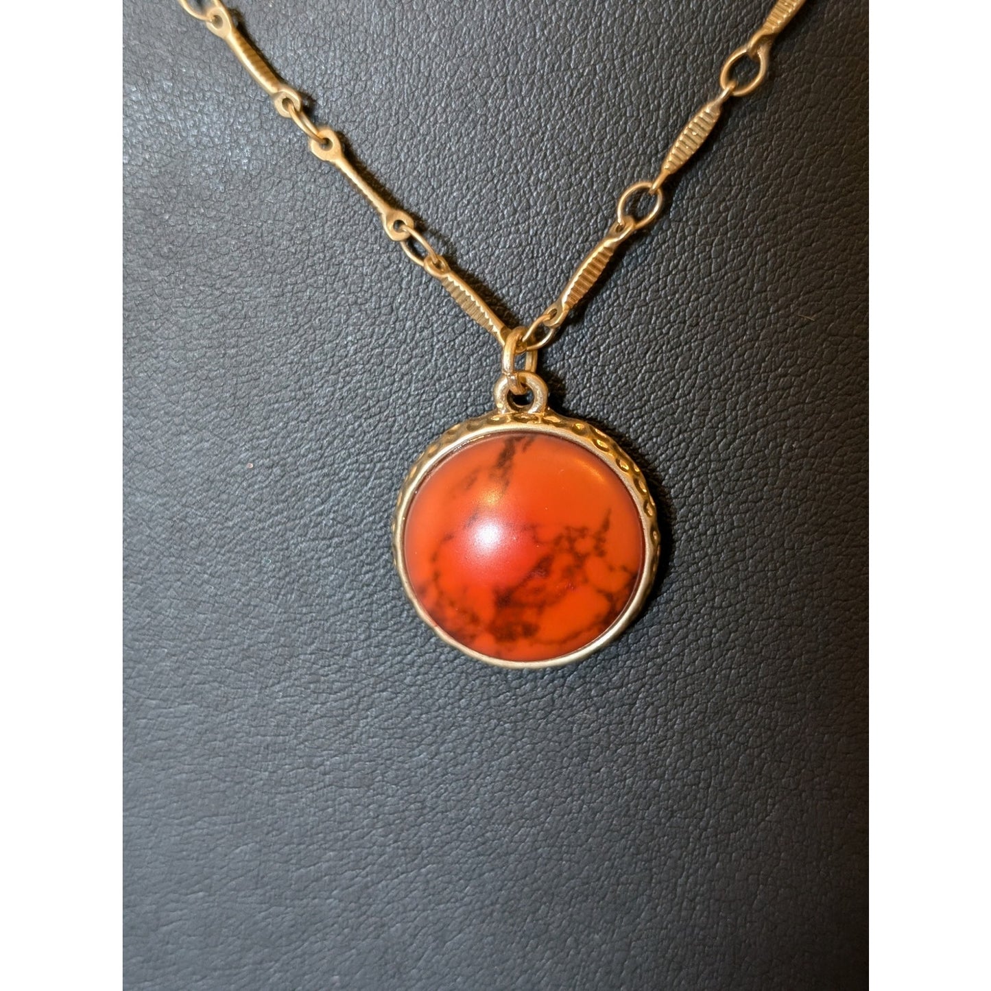 Plunder Orange Pendant 21-24" Gold Tone Necklace