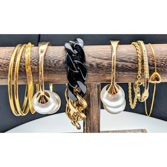 Lot of Nine Gold Tone Theme Bracelets