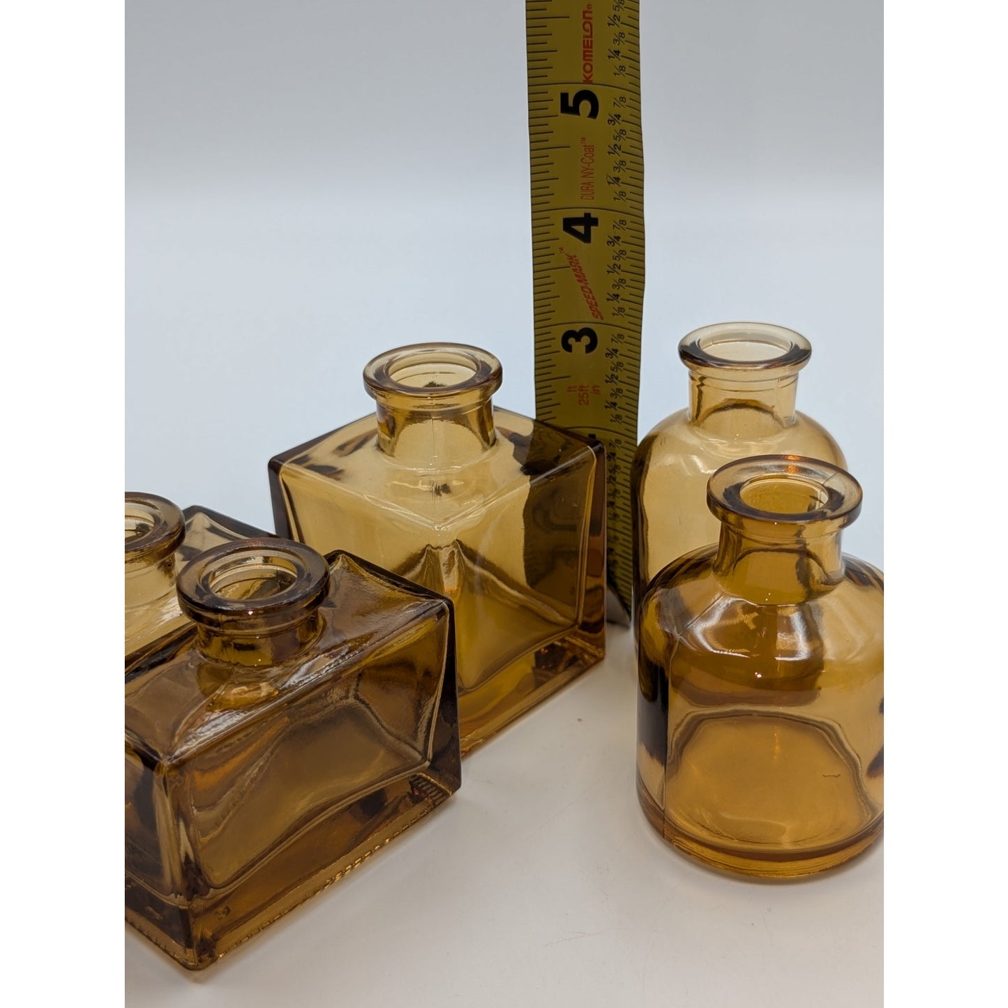 Five Brown Glass Multi-Shape Multi-Size Bud Vases