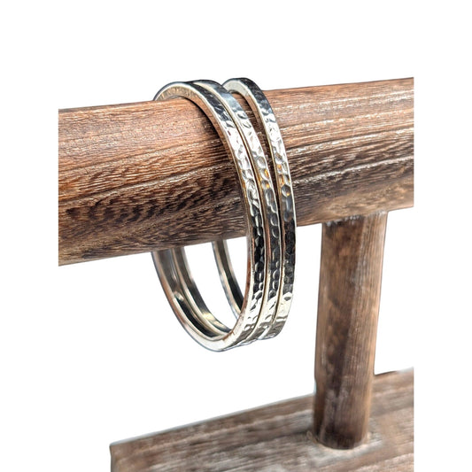 Three Silver Tone Hammered Silver Tone Bangle Bracelets