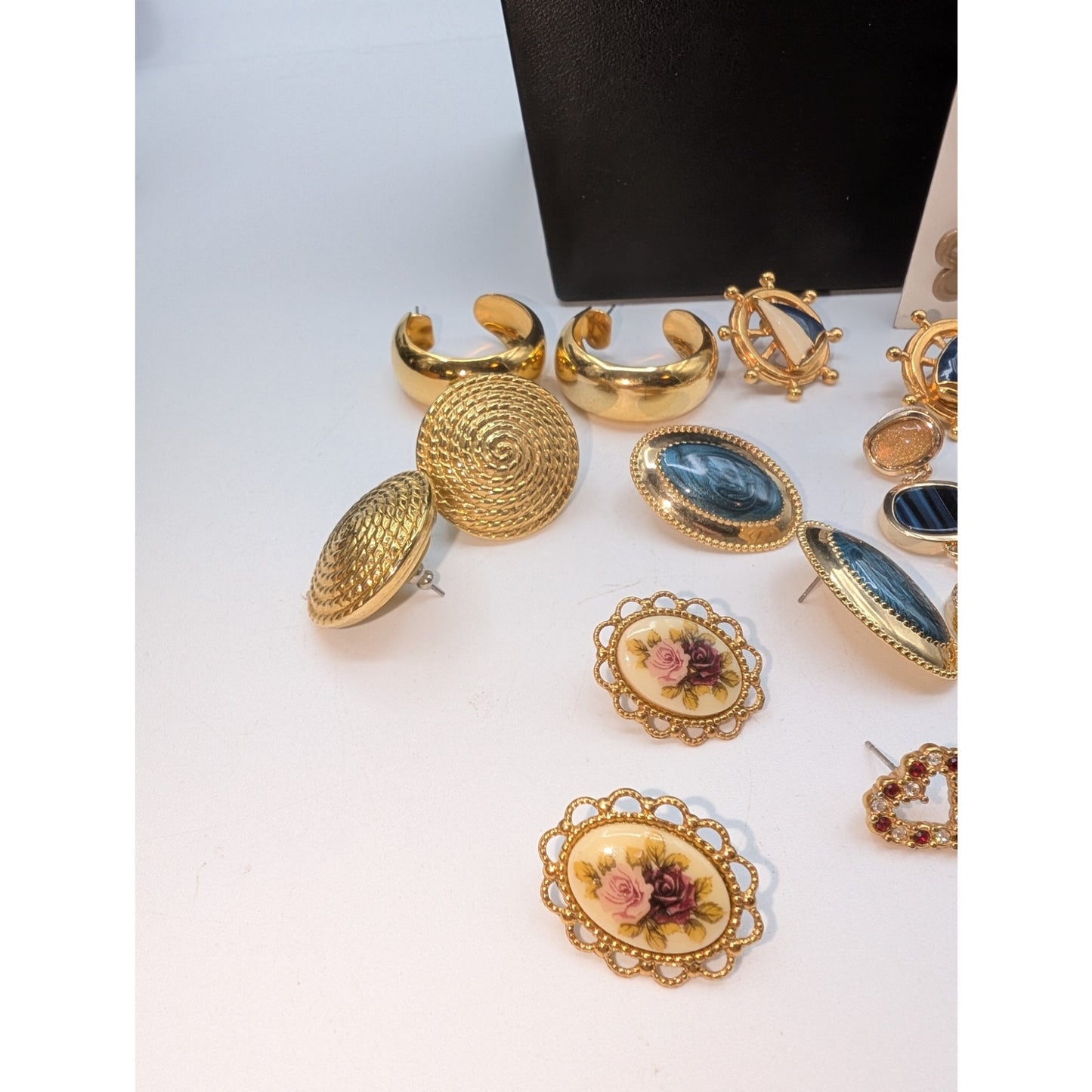 Eleven Pair of Gold Tone Pierced Earrings