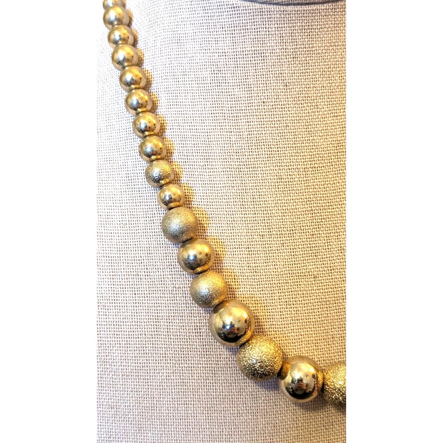 Vintage Gold Tone Polished and Textured Graduated Wire Strung Bead Necklace