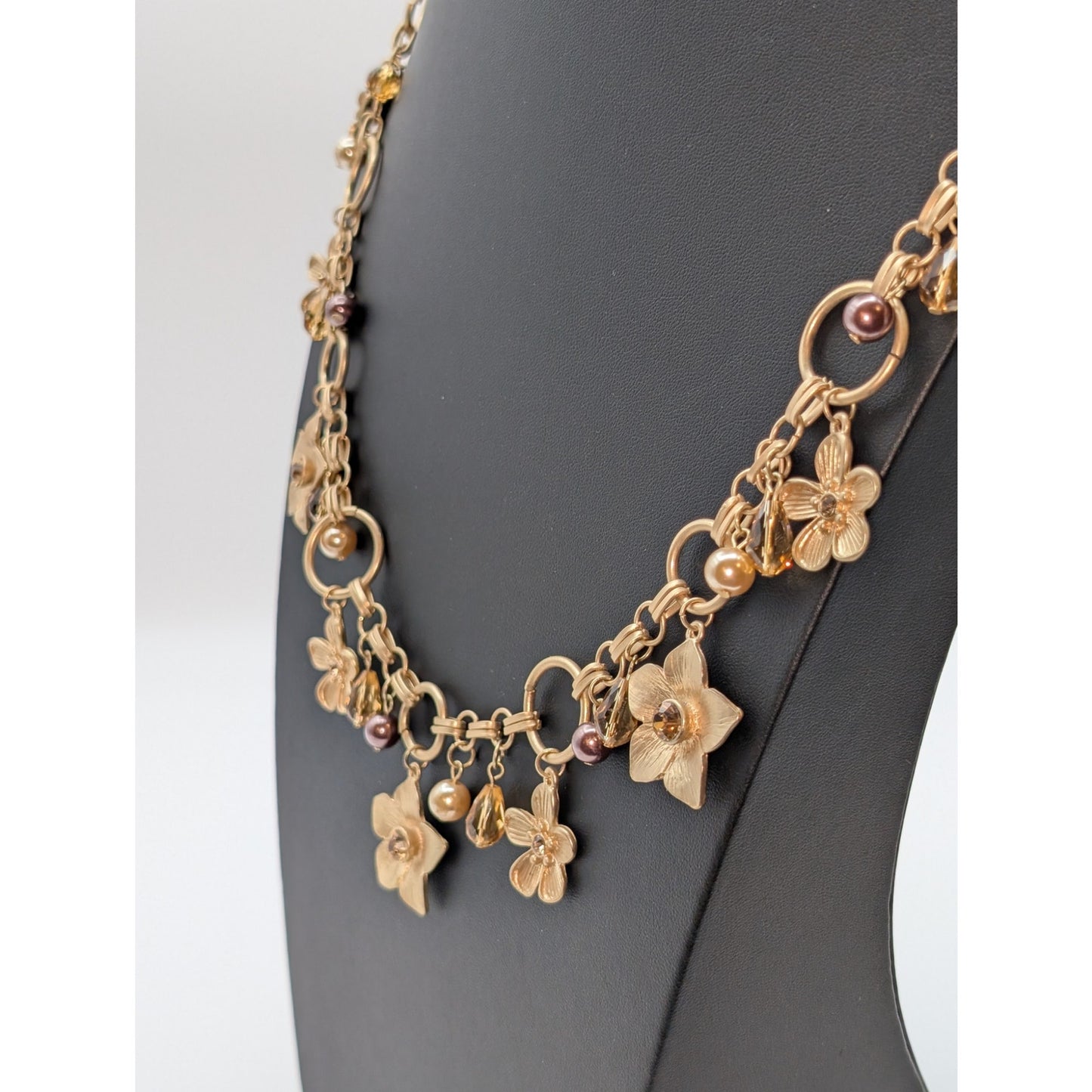 Lot of Two Gold Tone Dangling Flowers & A Giving Key Necklaces