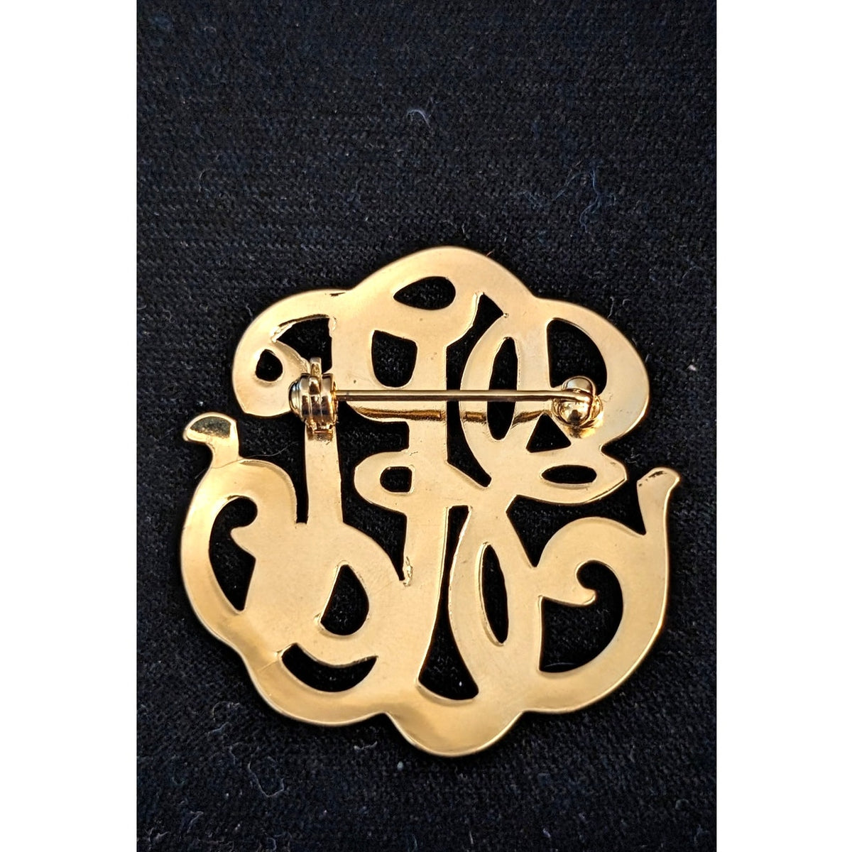 Vintage High Polished Goldtone Swirl Design Brooch