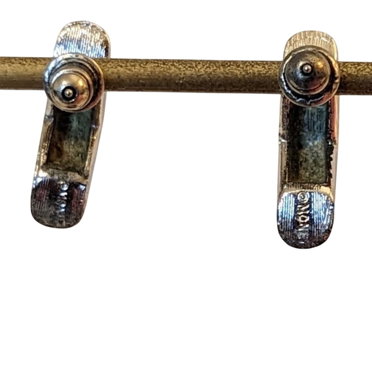 Monet Silver Tone 'Elbow' Post Earrings