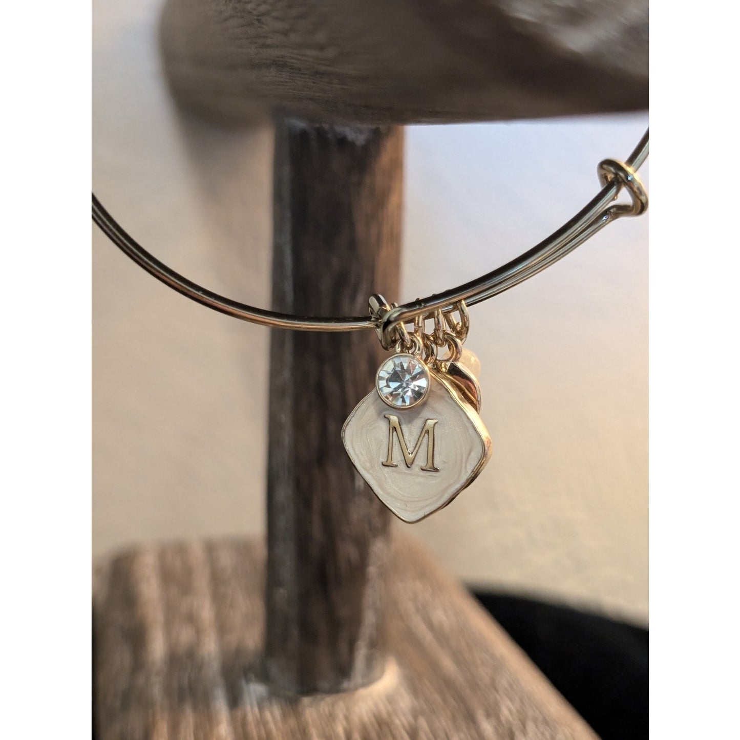Lot of Two Gold Tone Bracelets Monet Textured Bead Stretch & 'M' Charm Bangle