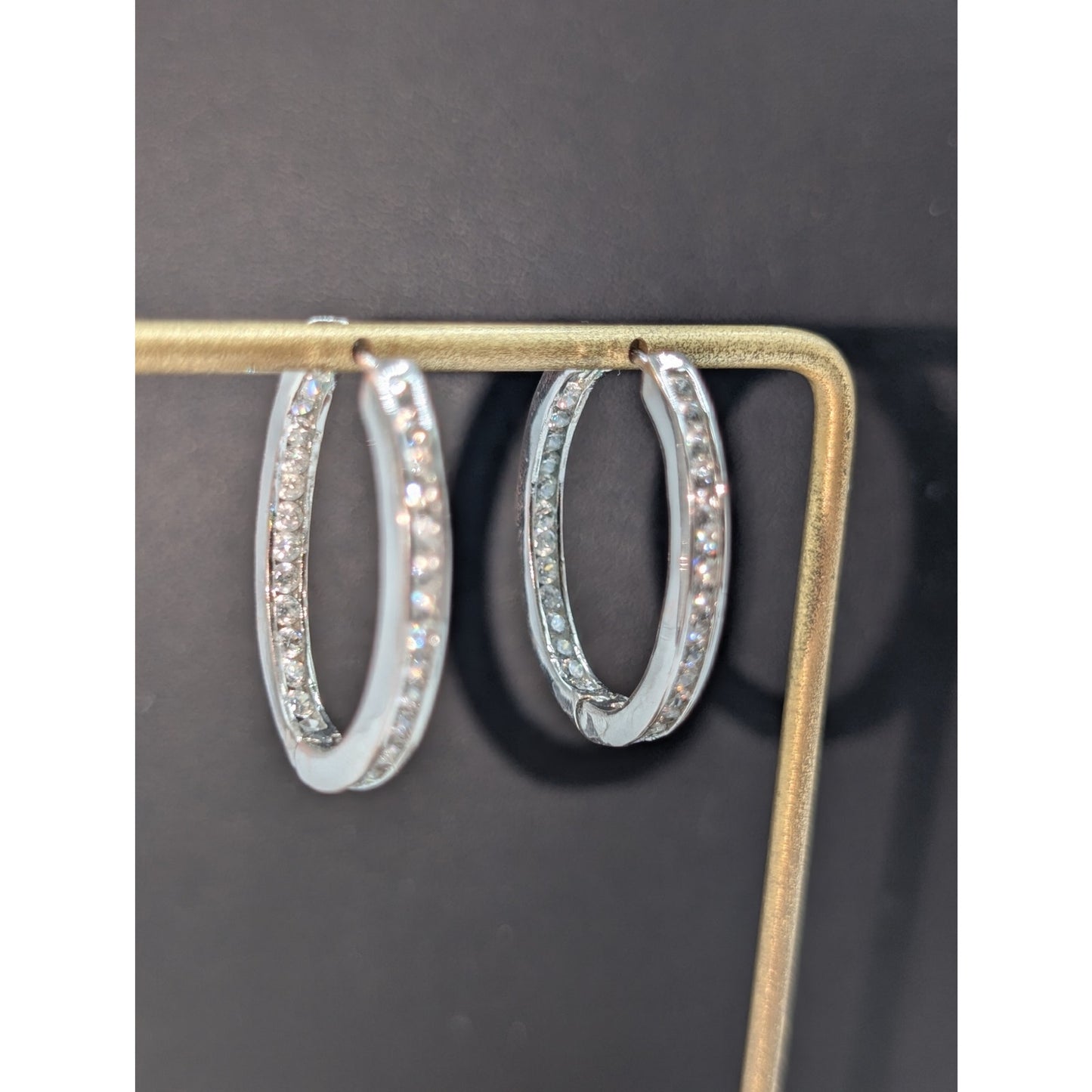 Silver Tone Non Magnetic CZ In and Out Oval Huggie Hoop Earrings