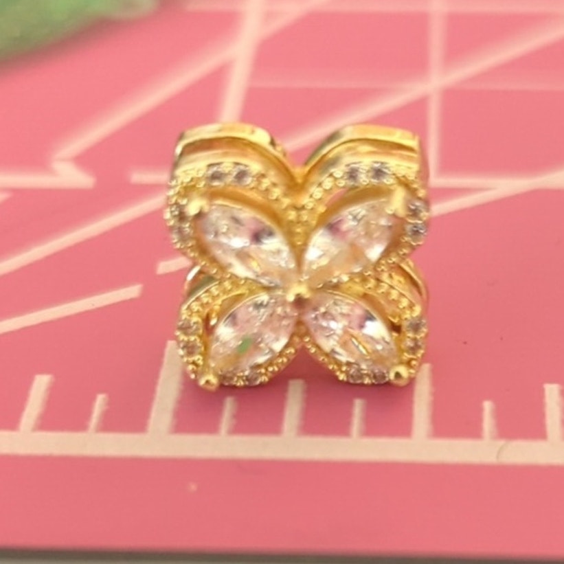 Crystal Gold Tone Spinning Flower Post Earrings