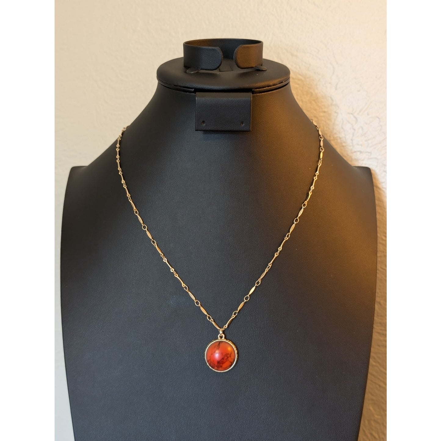 Plunder Orange Pendant 21-24" Gold Tone Necklace