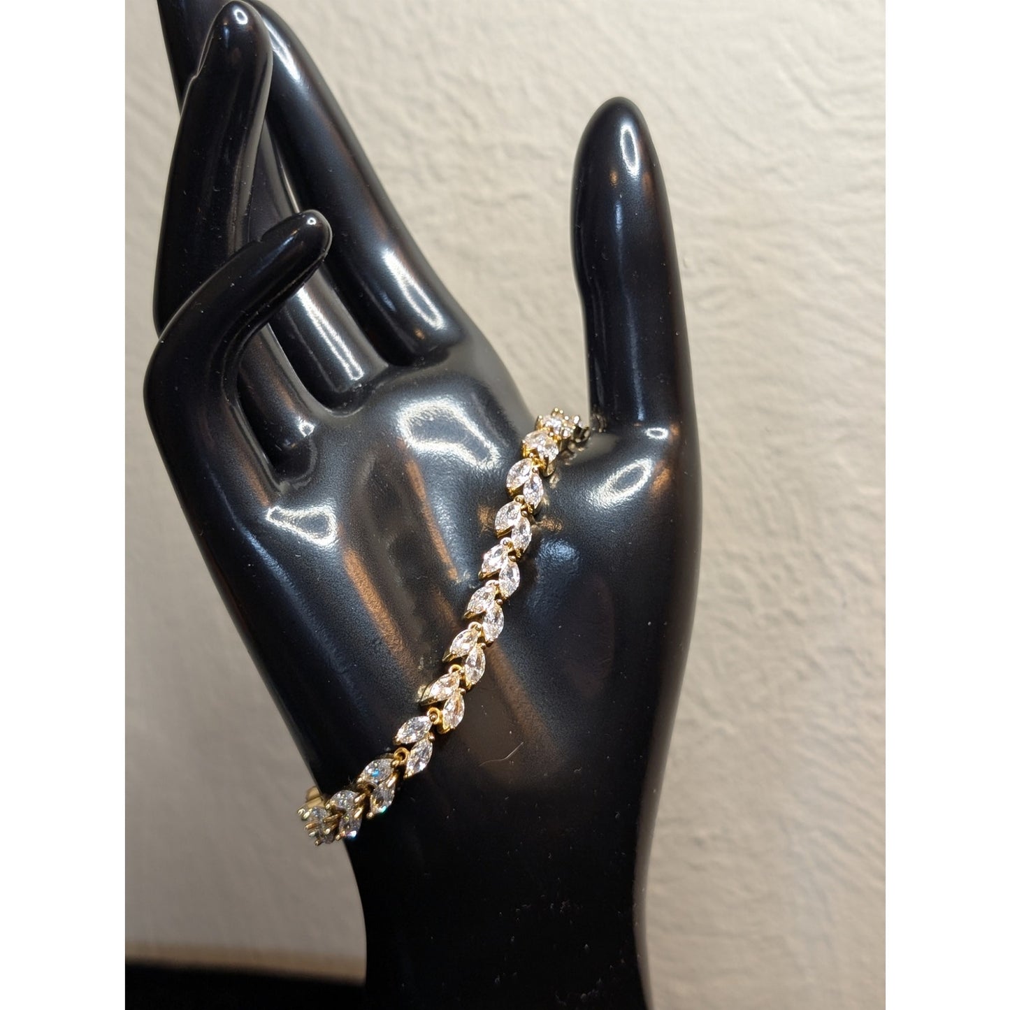 Gold Tone CZ Leaf 7" Long Tennis Bracelet W/ Fold Over Clasp