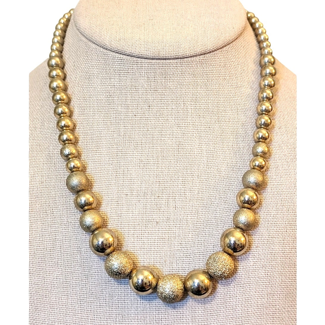 Vintage Gold Tone Polished and Textured Graduated Wire Strung Bead Necklace
