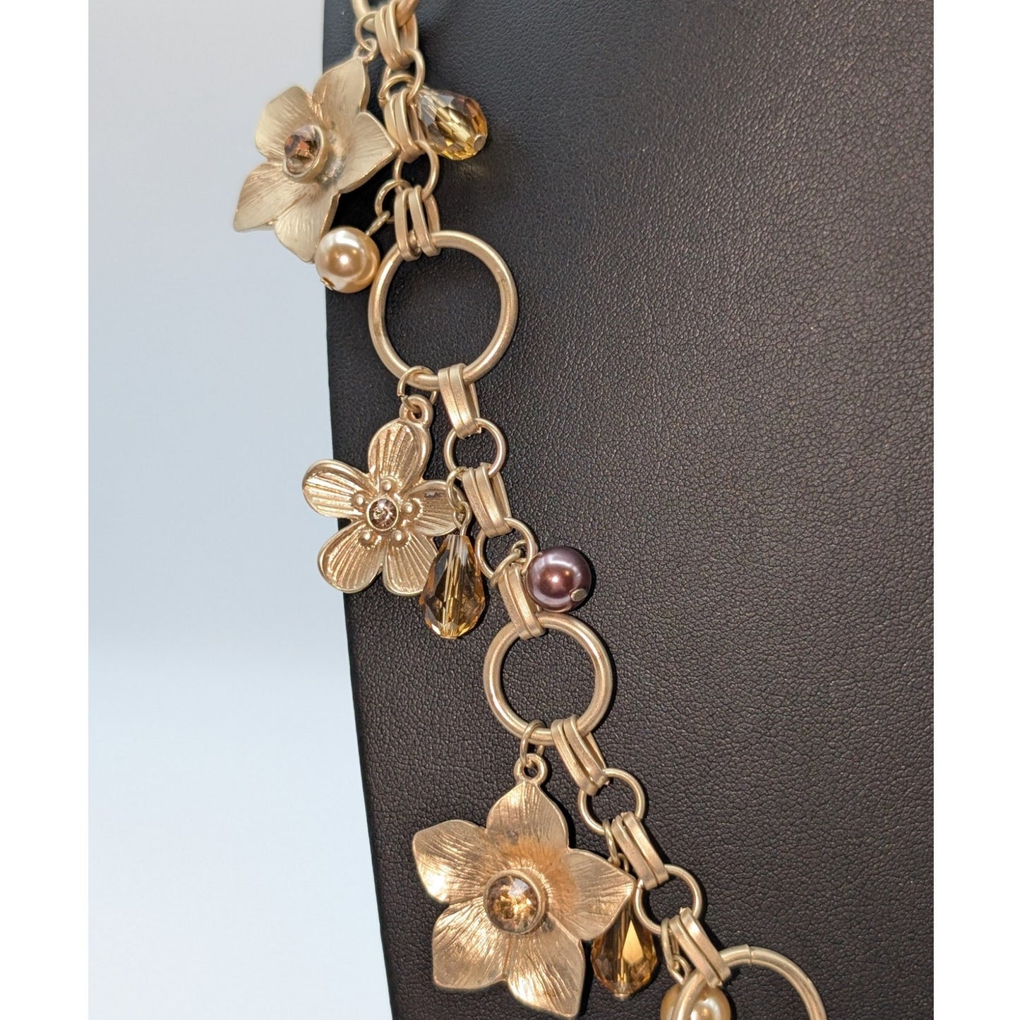 Lot of Two Gold Tone Dangling Flowers & A Giving Key Necklaces