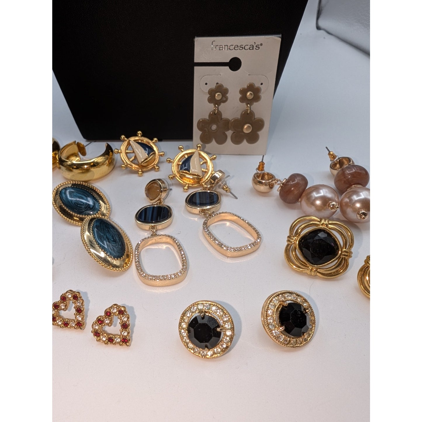 Eleven Pair of Gold Tone Pierced Earrings
