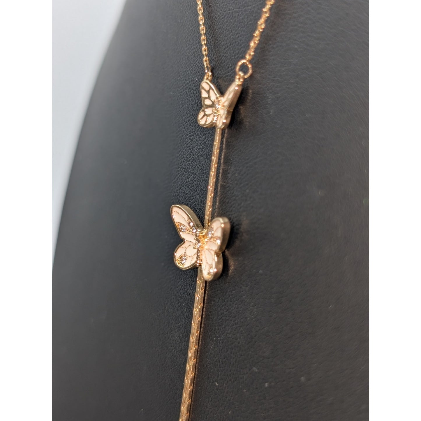 Jessica Simpson Gold Tone Two White Sparkle Butterfly Tassel 16"-19" Necklace