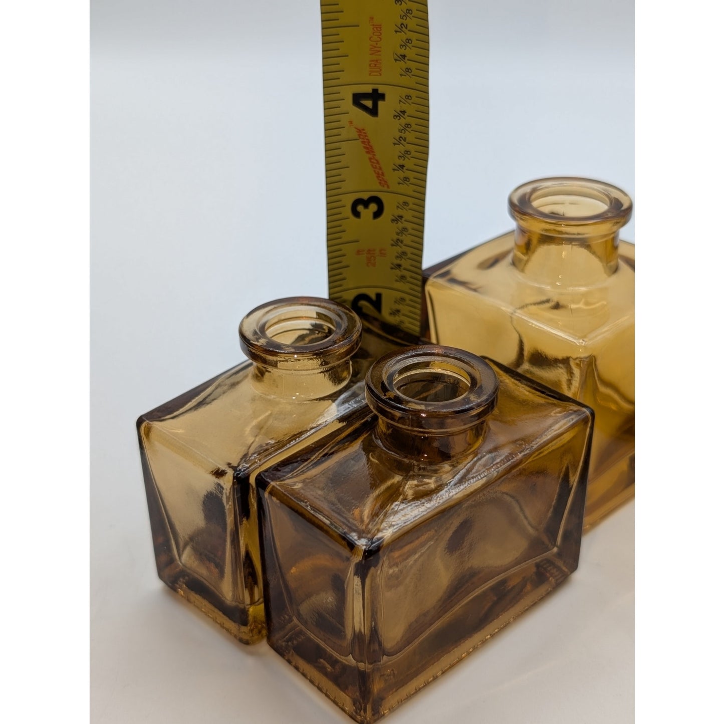 Five Brown Glass Multi-Shape Multi-Size Bud Vases