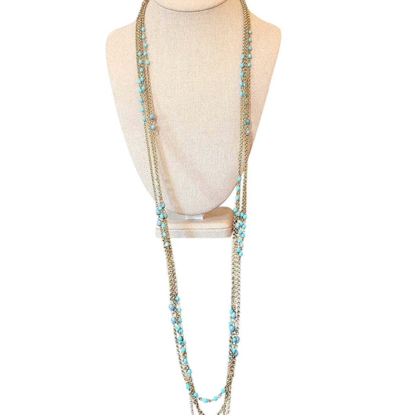 Multi-Strand Gold Tone Chain with Blue Bead Necklace with Braided Cord Closure