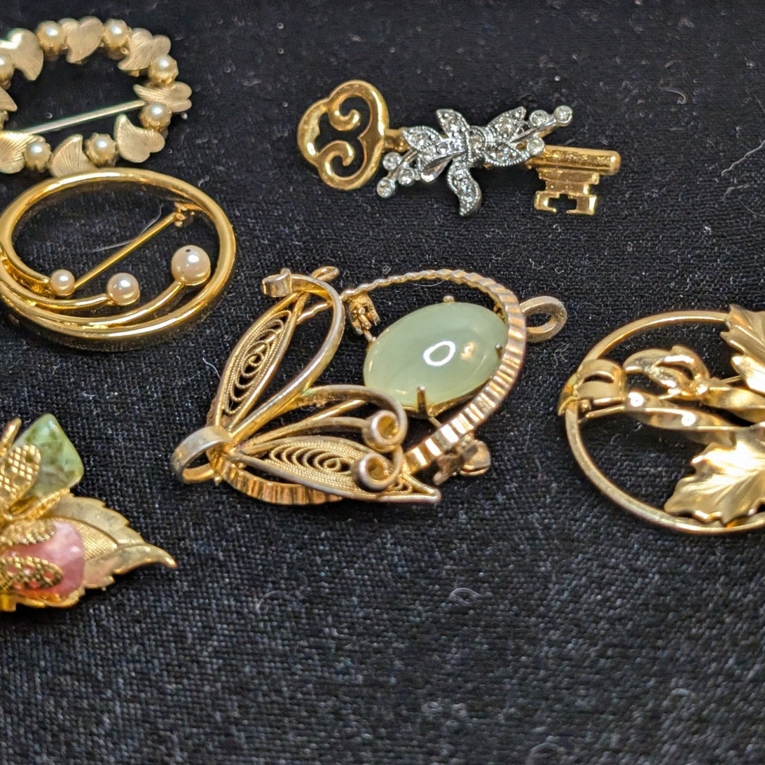 Lot of Eight Vintage Gold Tone Themed Brooches