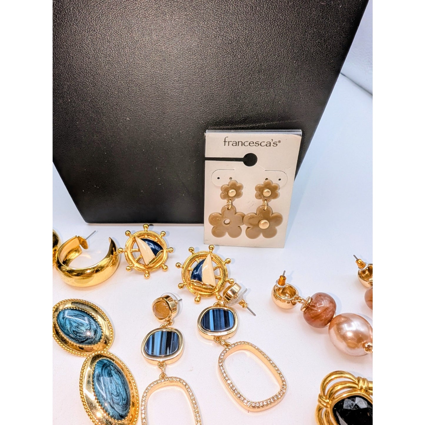 Eleven Pair of Gold Tone Pierced Earrings