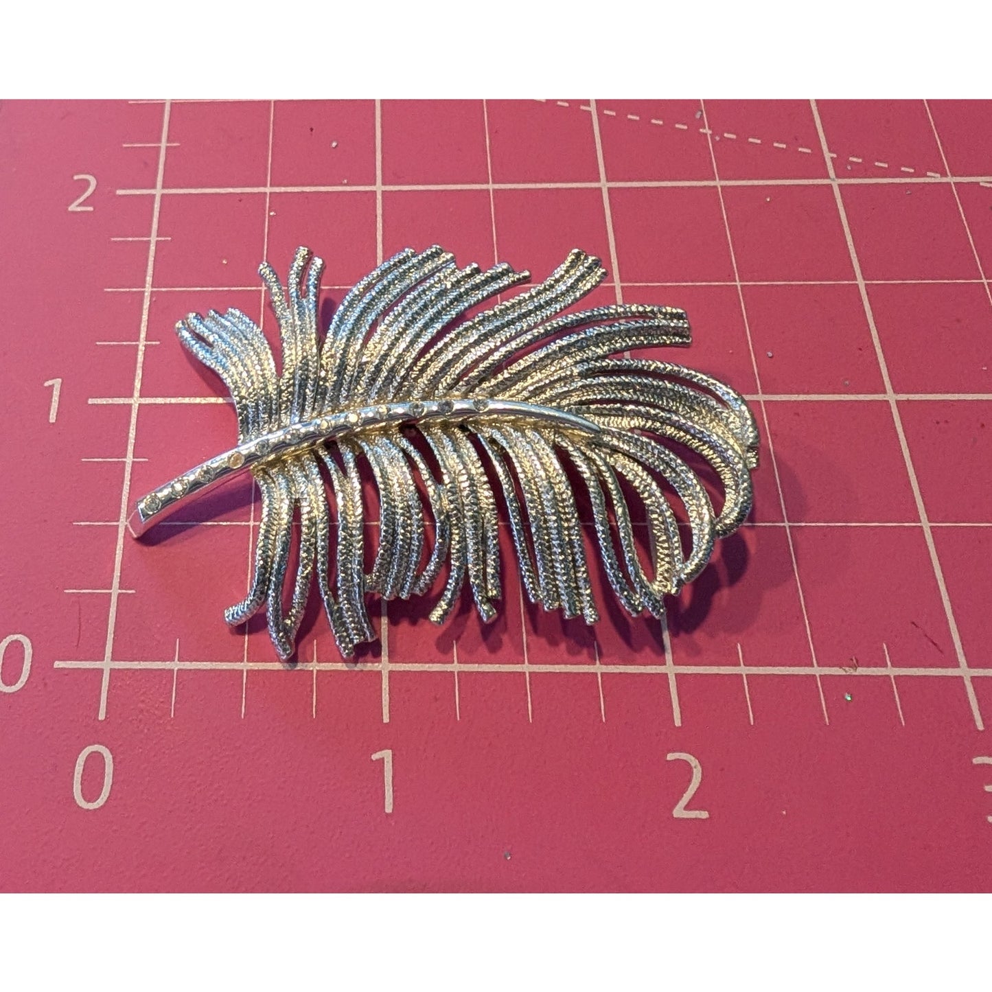 Vintage Monet Silver Tone Textured Rhinestone Feather Brooch Pin