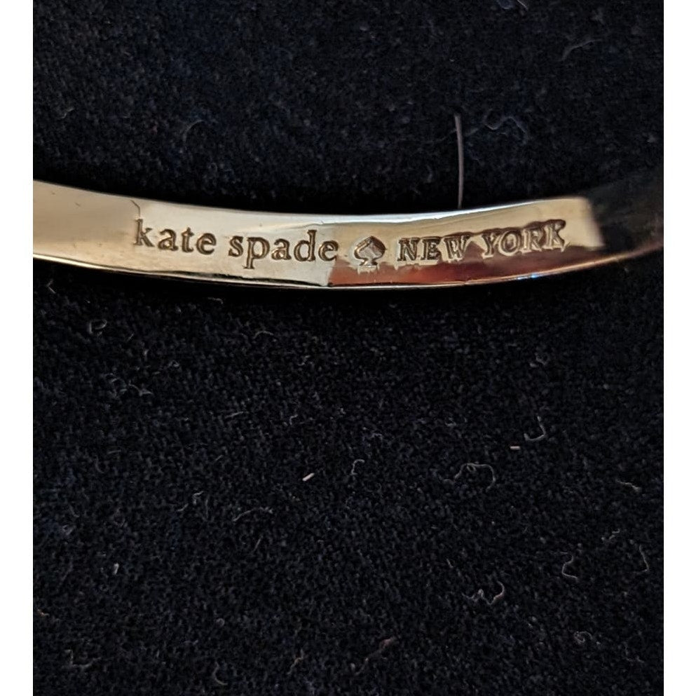 Kate Spade New York White Enamel Gold Tone Hinge Bangle Bracelet