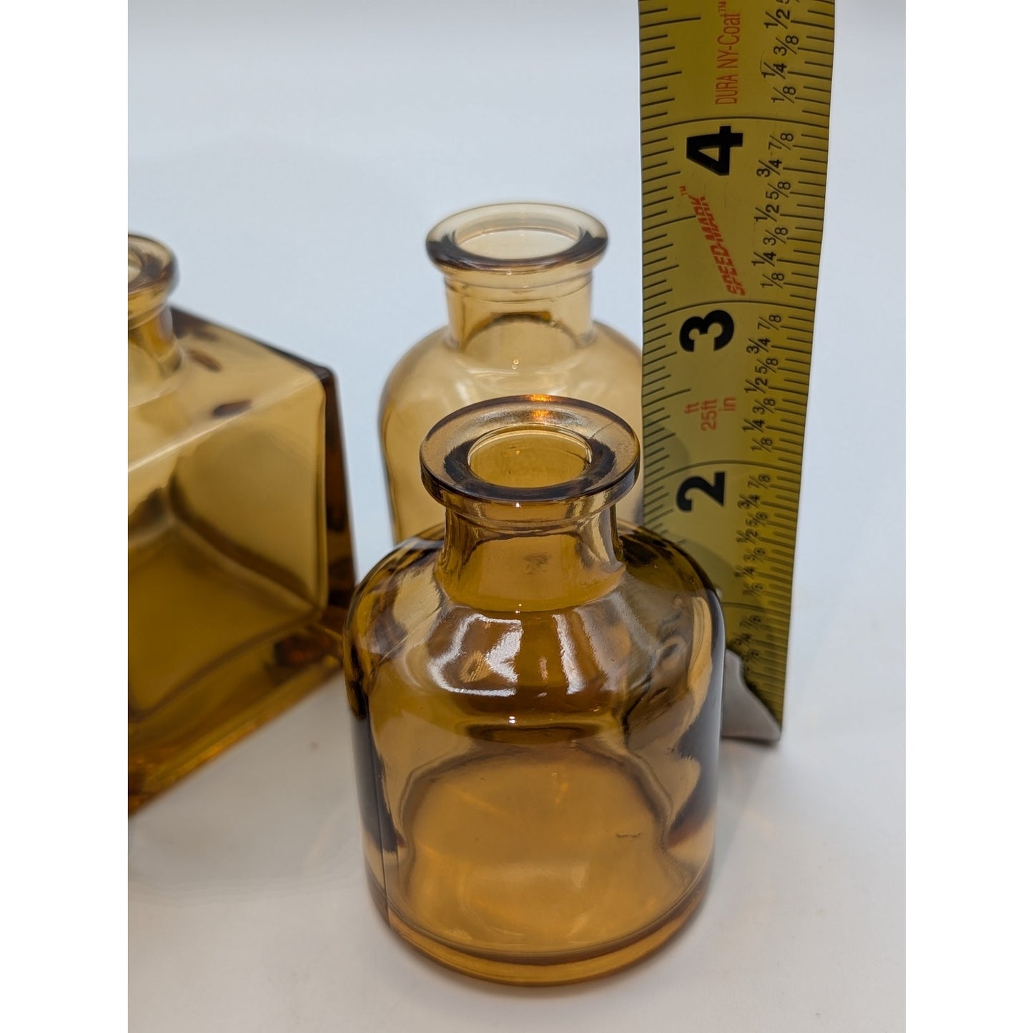 Five Brown Glass Multi-Shape Multi-Size Bud Vases