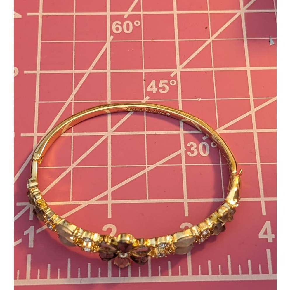 Anne Klein Gold Tone Crystal Floral Oval Bangle Bracelet
