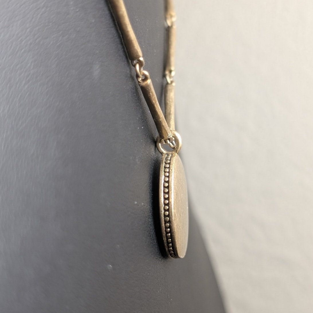 Vintage LIZ CLAIBORNE LC Antiqued Gold Tone Medallion Pendant Bar Chain Necklace