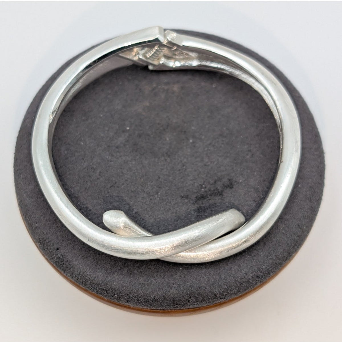 Brushed Satin Finish Silver Tone Knotted Hinged Closure Bangle Bracelet