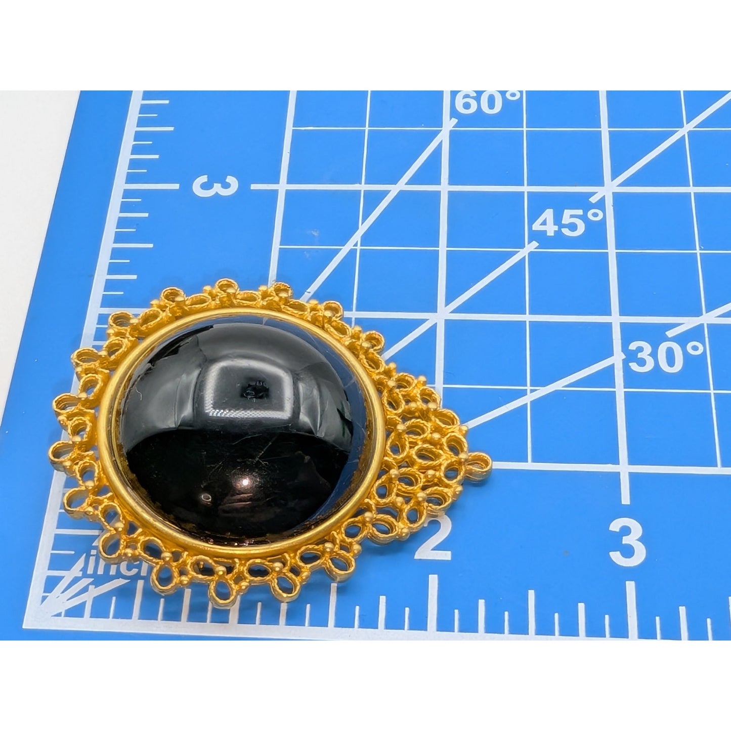 Lacy Gold Tone Surrounding Large Black Cabochon Bead Center Brooch