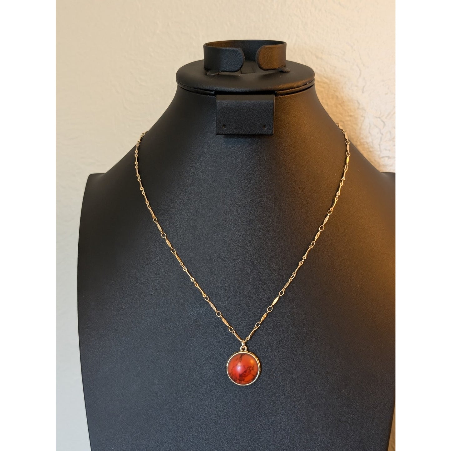Plunder Orange Pendant 21-24" Gold Tone Necklace