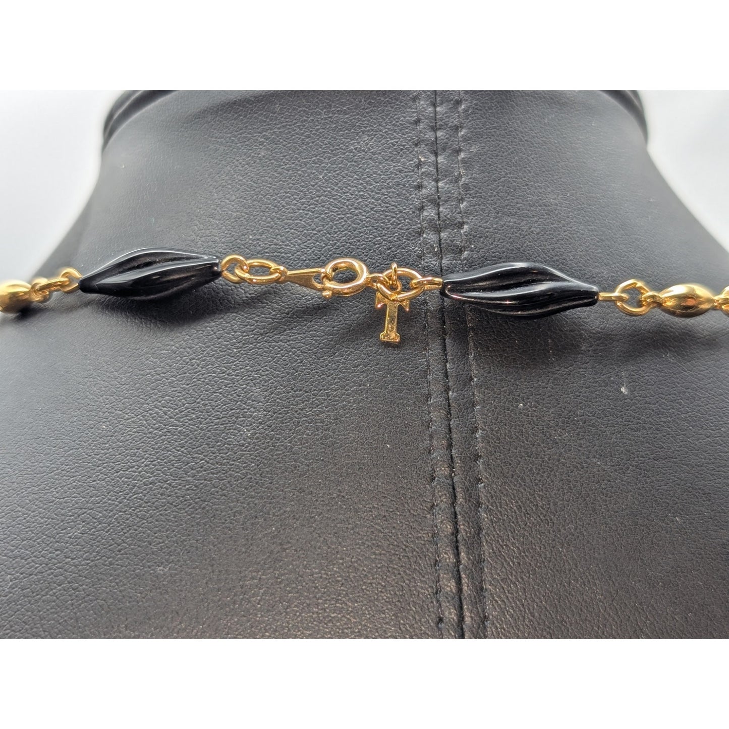 Vintage Trifari Gold Tone Black Carved Twisted Cylinder Glass Bead 31" Necklace