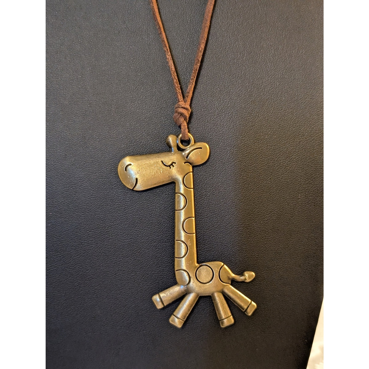 Brass Tone Cartoonish Giraffe Pendant Cord Necklace