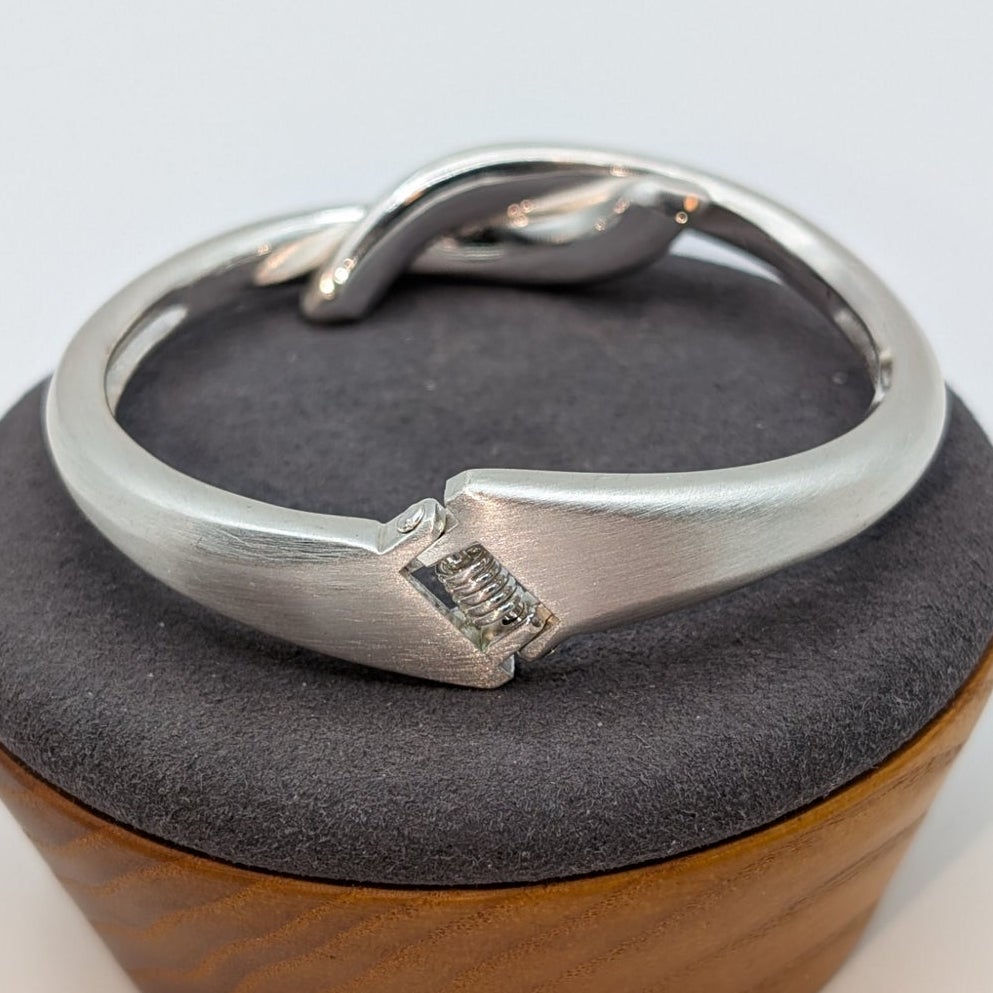 Brushed Satin Finish Silver Tone Knotted Hinged Closure Bangle Bracelet