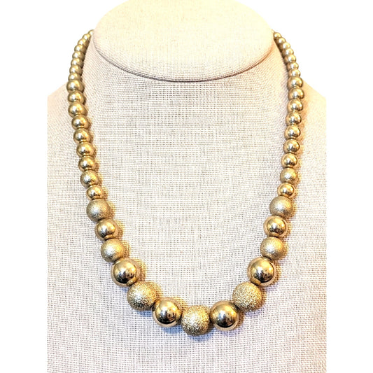Vintage Gold Tone Polished and Textured Graduated Wire Strung Bead Necklace