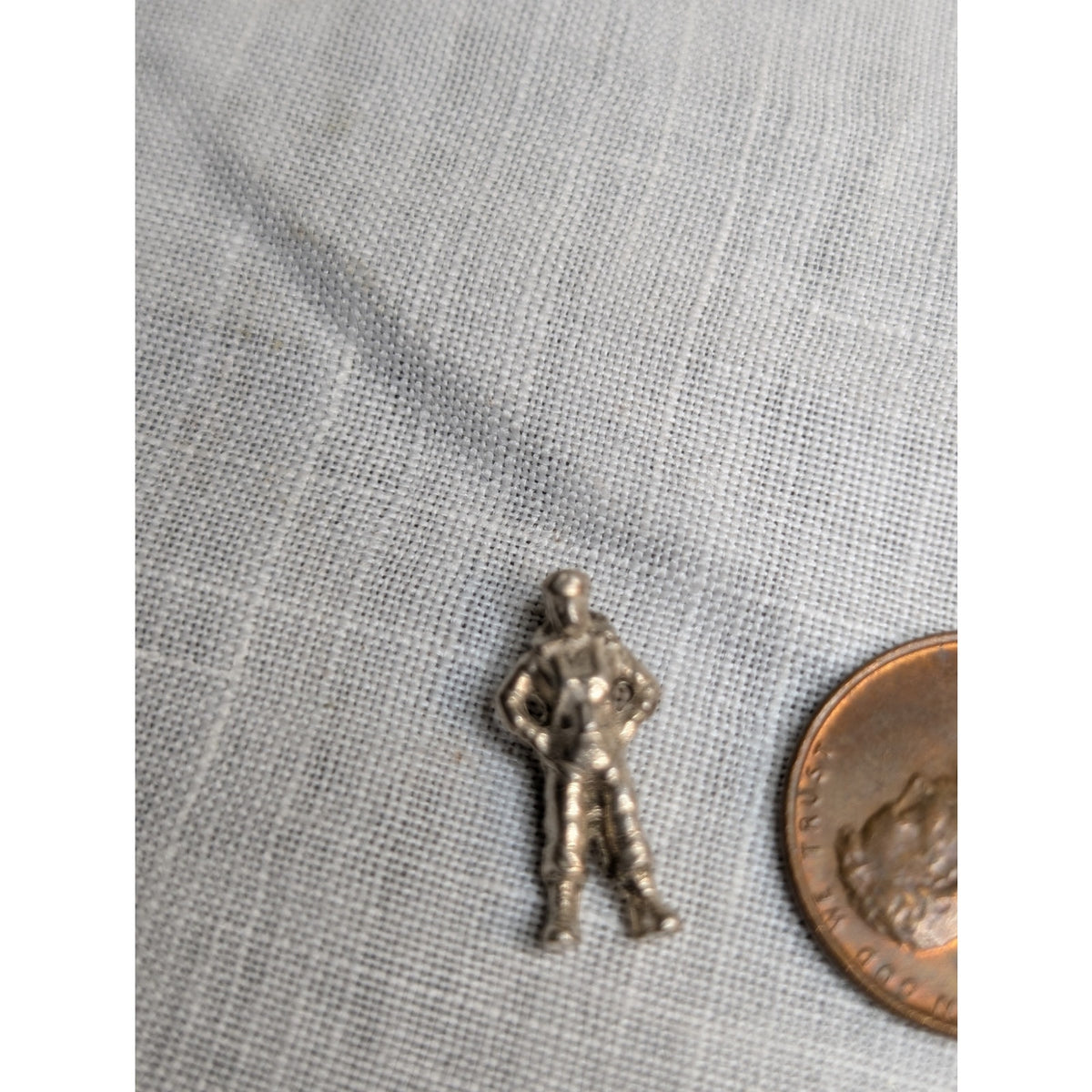 Vintage Tiny Silver Tone Man W/ Hands on Hips Possibly Astronaut Charm