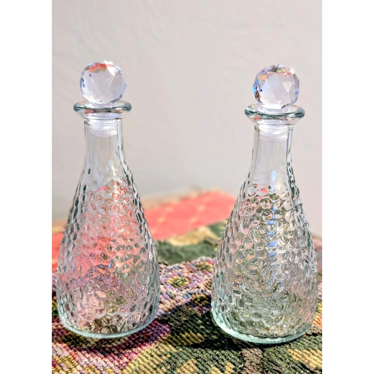 Set of Two Decorative Hammered Glass Bottles W/ Glass Stoppers