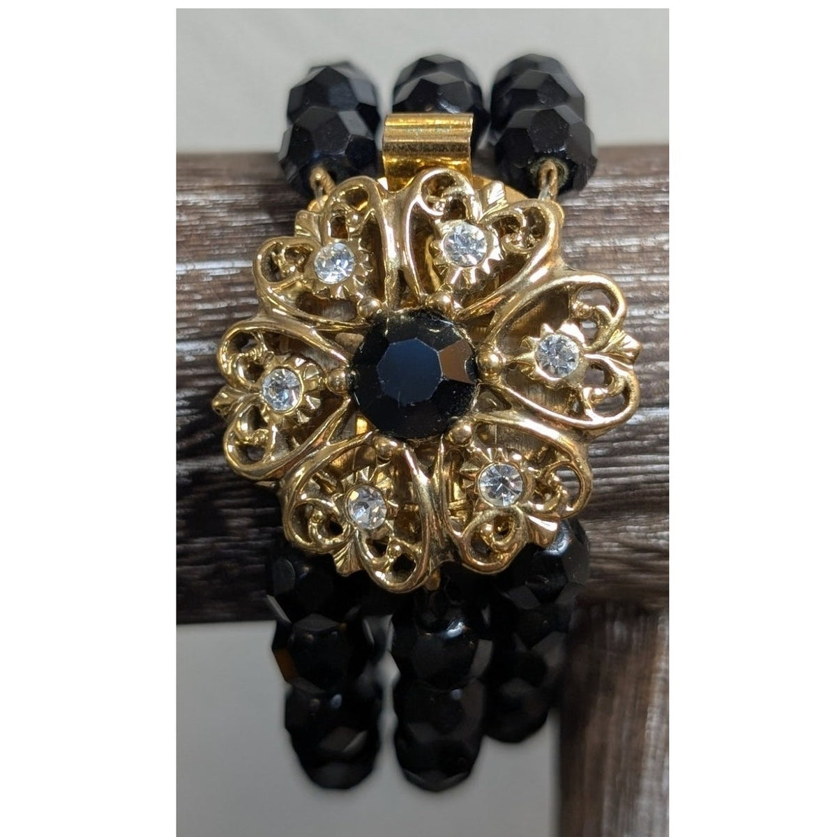 VTG Black Faceted Glass Bead Triple Strand Bracelet W/ Ornate Gold Tone Clasp